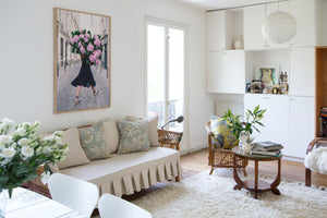 Free and Fearless is a photo of a girl in Paris in St Germain des Prés holding a giant bouquet of pink hydrangeas and is part of a limited edition series named Young Girl in Bloom by photographer Carla Coulson celebrating women loving and believing in themselves and building their self esteem by trusting their intuition.